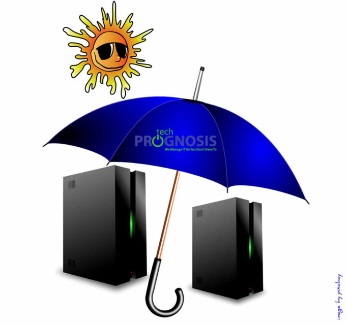 Image of a Tech Prognosis umbrella protecting two servers from the heat of the sun to prevent heat-induced server meltdowns.